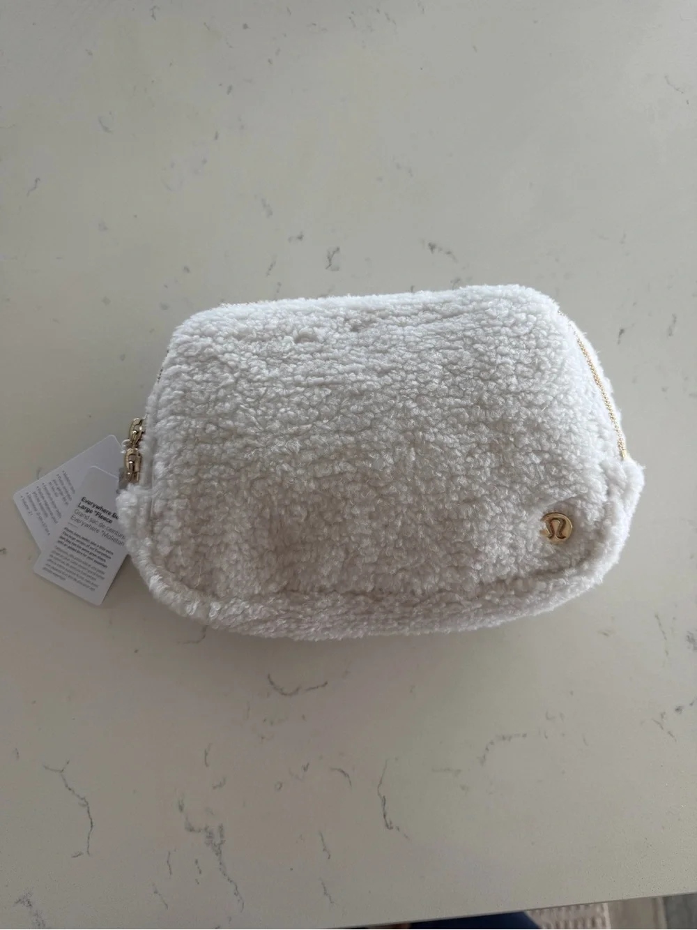 New lululemon athletica Cream Sherpa Pouch with Gold Accents